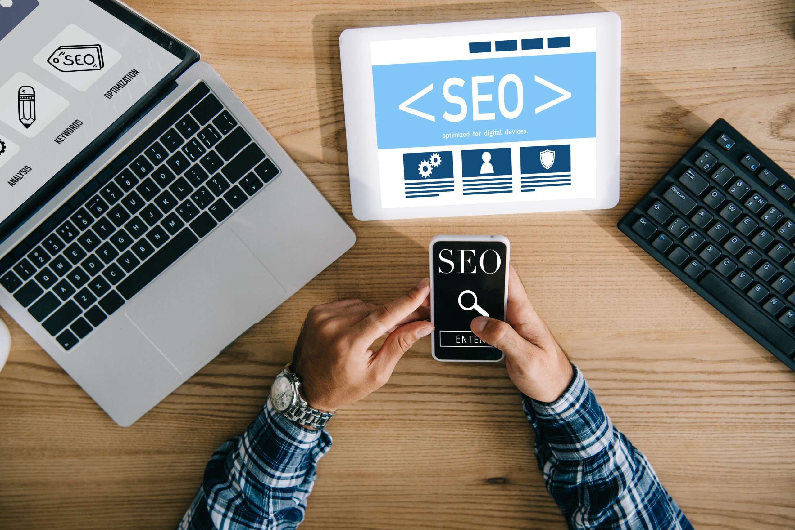 SEO manager using digital device for search optimization