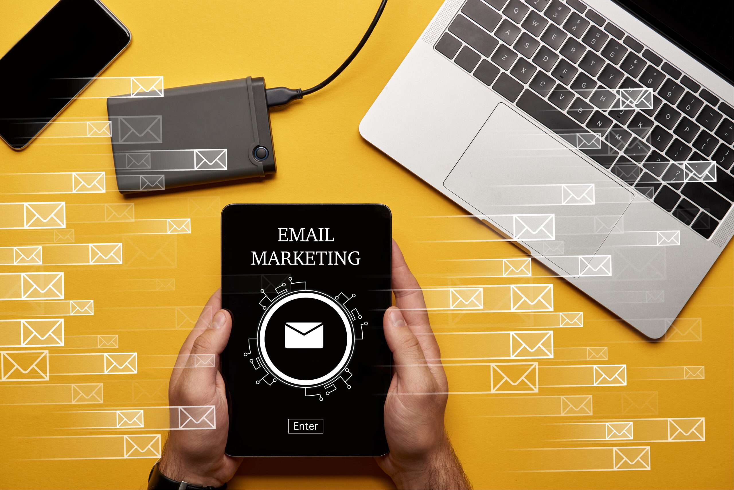 Digital marketer using tablet for email marketing